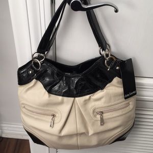 Daisy Fuentes Cream & Black Tote bag. Never used